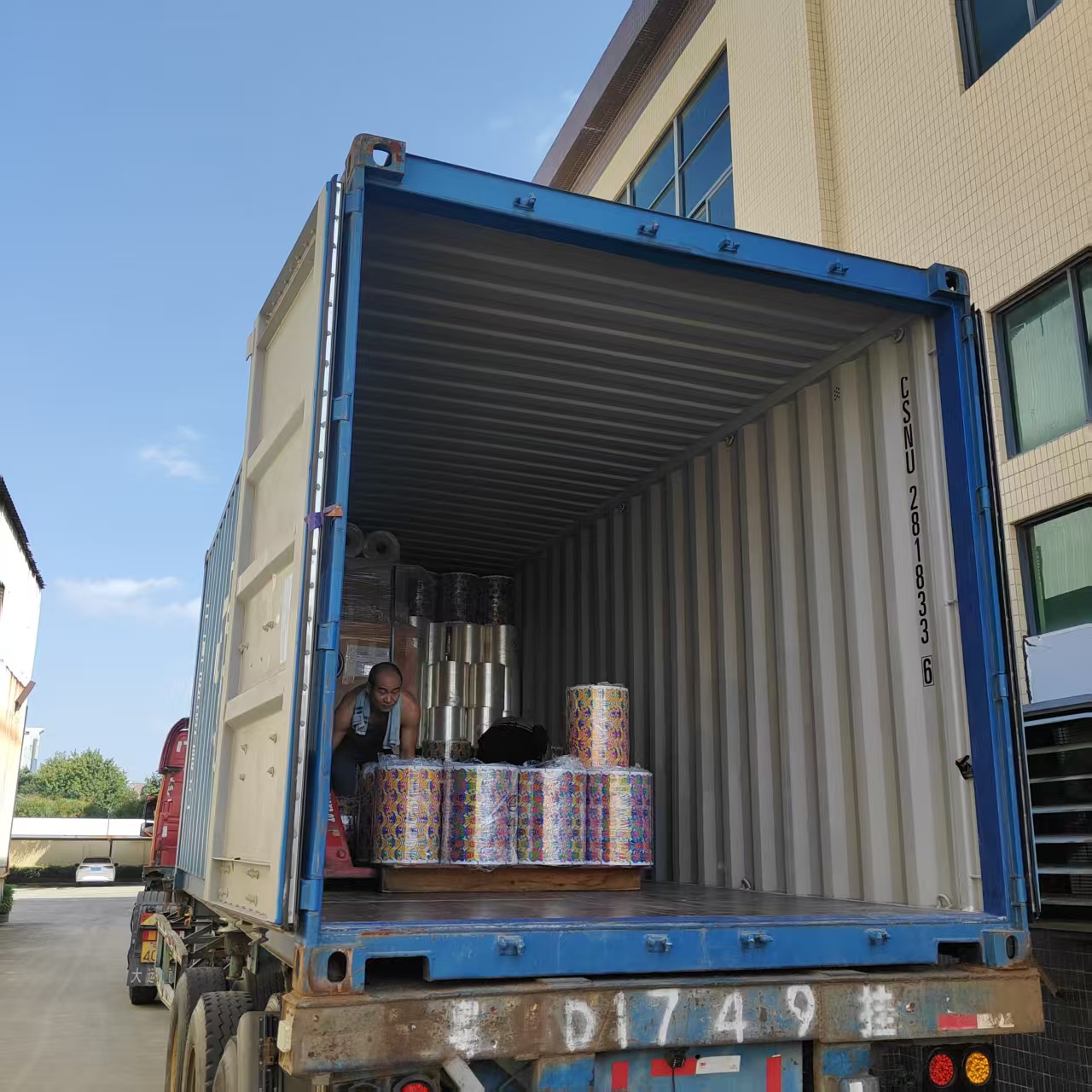 Roll material inside a container